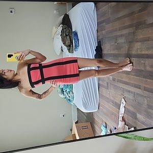 Coral and black body con dress